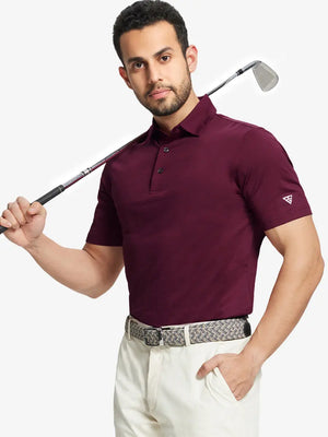 Front half-body shot of model holding golf club wearing Ventilated Heather Jacquard Polo – BURGUNDY HEATHER