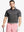 Model front half-body holding golf club wearing BLACK Performance Ananas Jacquard Polo