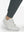 Detail view of hem on dark grey flat front golf joggers pants with belt loops