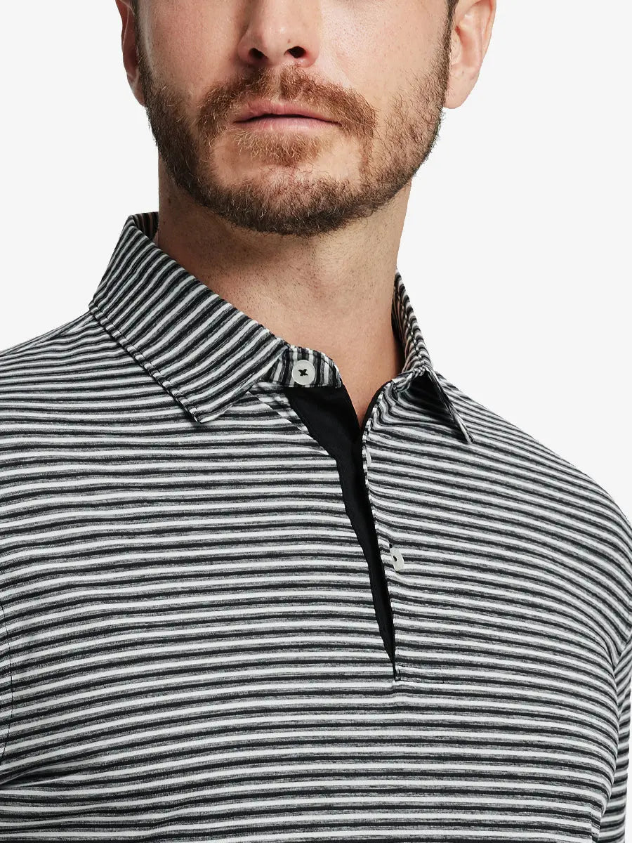 Front close-up shot of model from nose to chest wearing Sport Fit Stripe Polo in Black Stripe