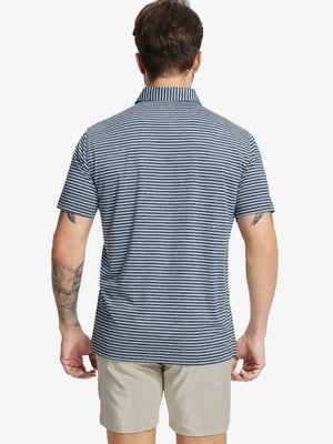 Back half-body shot of model showcasing the back of Sport Fit Stripe Polo in Dark Blue Stripe