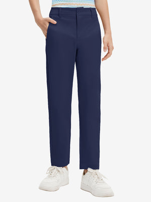 Front lower body shot of model wearing the dark blue youth water resistant cotton blend golf pants, showcasing a relaxed fit