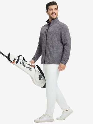 Full body shot, model carrying golf bag in textured insulated winter jacket, active outdoor style, black heather.