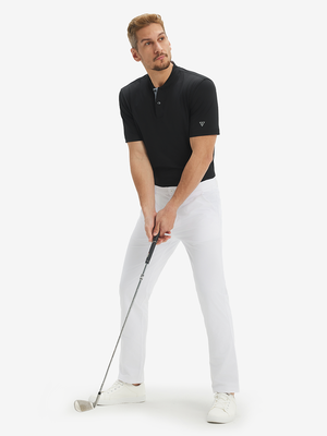 Full-body front: model in black moisture-wicking short sleeve henley shirt addressing golf ball.