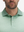 Close-up: nose to chest in green abstract lines lightweight stretch upgraded print golf polo shirts
