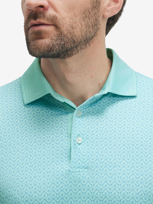Close-up: nose to chest in pea green goose lightweight stretch upgraded print golf polo shirts