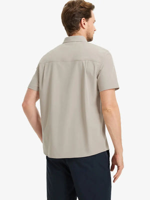 Half-body back view displaying the clean lines of the DARK KHAKI polo.