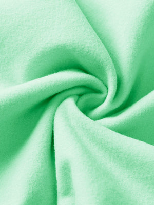 Fabric close-up of turquoise boys stretch fleece lined casual golf pants, soft stretch fabric with warm fleece lining.